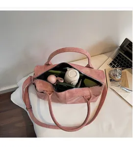 Spacious pink faux leather Boston bag interior showing capacity for daily travel essentials