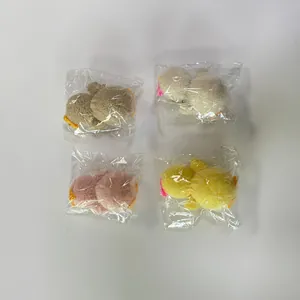 Set di 4 ciondoli a forma di pulcino in peluche pasquale nei colori marrone e rosa