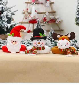 Detailed view of Santa, Snowman and Reindeer plush buckles with festive scarves