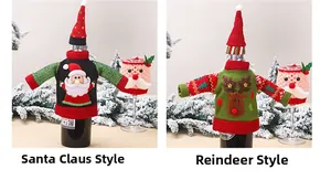 Detail view of Santa and Reindeer knitted wine bottle sweaters and hats for Christmas tables