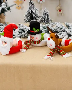 Detail of Santa, Snowman and Reindeer plush curtain buckles for Christmas window decor
