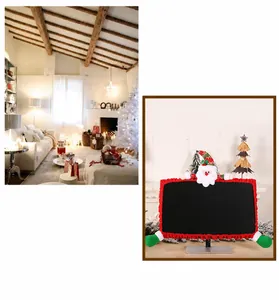 Detailed view of red Christmas computer monitor cover with 3D Santa Claus figure