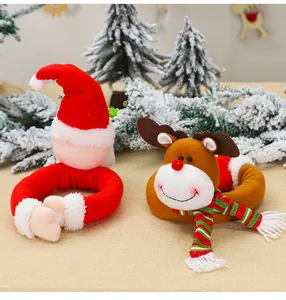 Detail of plush Santa and Reindeer curtain buckles for festive Christmas window decor