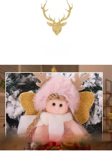 Detail of plush Christmas angel ornament with pink faux fur hood and golden antlers
