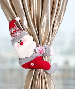 Detailed view of knitted Santa Claus curtain tieback used on festive window curtains