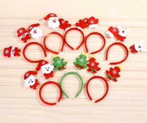 Flat lay of colorful Christmas headbands with Santa, reindeer and tree motifs