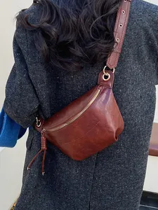 Vintage dark brown wax leather crossbody saddle bag with adjustable wide eyelet strap