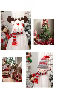 Detail of Christmas reindeer and snowman curtain tiebacks in a festive home setting