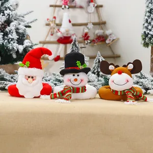 Three Christmas curtain buckles with Santa, snowman and reindeer figures for holiday decor