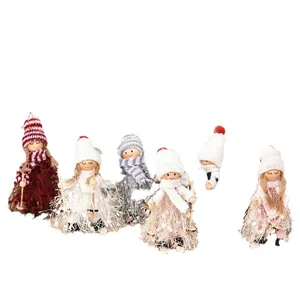 Set of six handmade Christmas skiing dolls with knit hats and scarves for tree decoration