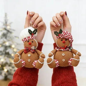 Knitted gingerbread man ornaments with chef hat and scarf for Christmas tree decor