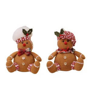 Plush Christmas gingerbread man set with chef hat and plaid accents on white background