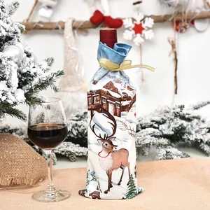 Housse de bouteille de vin de Noël avec imprimé renne dans un décor de table festif