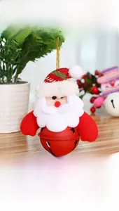 Detail of Santa Claus plush bell ornament with red sequins and white fur trim