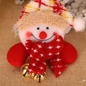 Cute plush snowman Christmas brooch decoration with golden bells and festive red scarf
