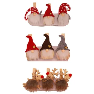Handmade Christmas wooden gnome and reindeer clips with felt fabric for festive decor