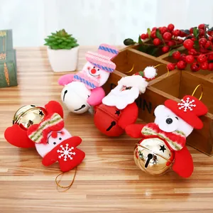 Christmas tree ornaments set with Santa and snowman figures on festive metal bells