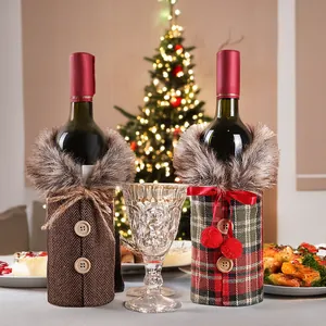 Christmas wine bottle covers in herringbone and plaid fabric with faux fur trim