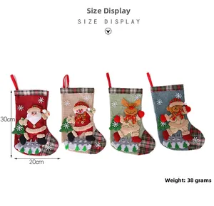 Size display of 30x20cm Christmas stockings with reindeer, snowman and Santa motifs