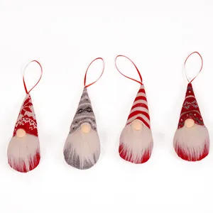 Set of 4 knitted Christmas gnome hanging ornaments with red striped and snowflake patterns