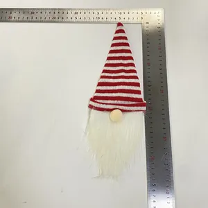 Christmas gnome bottle cover detail with size measurement using a ruler showing 30cm length