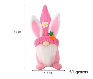 Detail shot showing dimensions of 18cm height for pink Easter bunny gnome plush