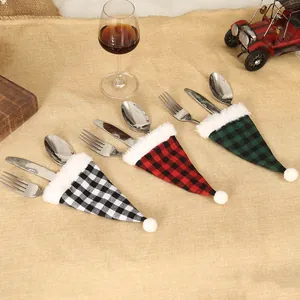 Christmas plaid cutlery bags with mini Santa hats and plush trim for holiday table decor