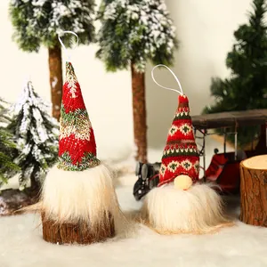 Christmas light-up gnome set with red knitted hats and long beards on festive background