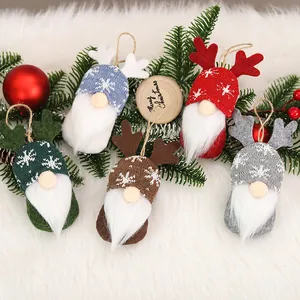 Set of 5 knitted Christmas gnome ornaments with snowflake patterns and plush beards