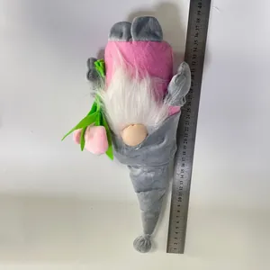 Detailed size view of a 40cm plush Mother's Day gnome holding a pink tulip flower