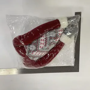 Detailed size measurement of the red Christmas gnome tree topper with plush faux fur trim