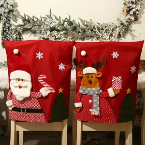 Set of two festive red Christmas chair covers featuring 3D Santa and Reindeer designs