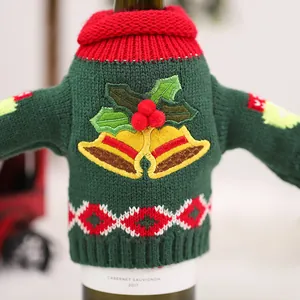 Christmas wine bottle cover featuring green knit fabric with red collar and bell embroidery