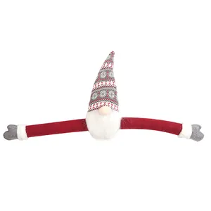Nordic Christmas gnome tree topper with long red arms and gray snowflake knitted hat