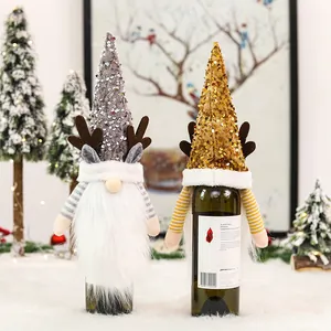 Sparkly sequin Christmas gnome wine bottle covers with antlers in gold and silver