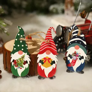 Three creative painted wooden Christmas gnome pendants with rustic jute hanging strings