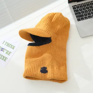 Ginger yellow knitted balaclava for kids with blue bear embroidery and fleece lining