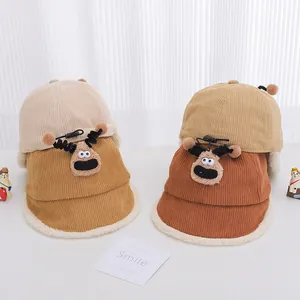 Kids corduroy winter bucket hat with plush trim and cute reindeer design in four colors