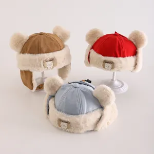 Winter fleece-lined baby trapper hat with cute bear ears and protective earflaps