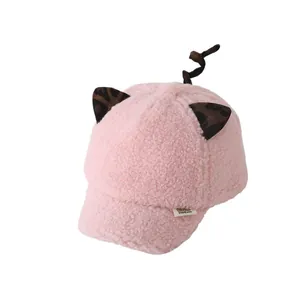 Pink plush baby baseball cap with cute leopard ears and furry fleece texture