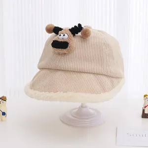 Detail of baby corduroy bucket hat with plush reindeer design and soft fleece brim edge