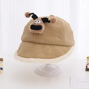 Close-up of khaki corduroy kids hat featuring a 3D cartoon deer and white faux fur trim
