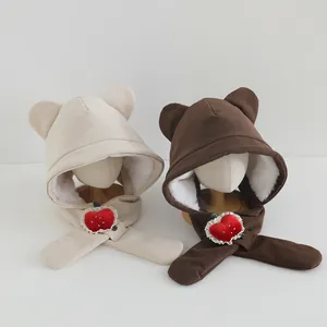 Detailed plush lining and corduroy texture of windproof winter hat with bear ears
