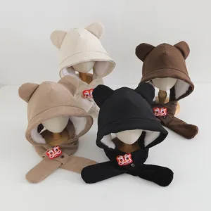 Close-up of children winter earflap hat with fleece lining and lion embroidery details