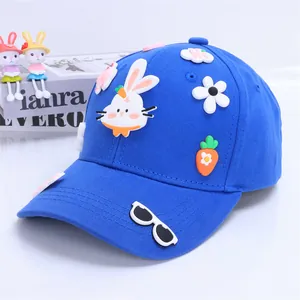 Detailed view of kids blue baseball cap with cute 3D bunny and carrot patches