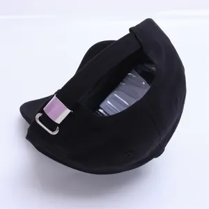 Rear view of black canvas baseball cap featuring an adjustable metal buckle and strap