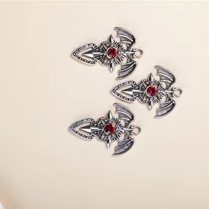 Gothic bat wing cross pendants with red rhinestones in vintage silver finish set of 3