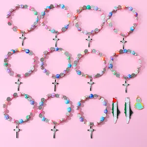 Colorful religious beaded bracelet set featuring crosses and Palestine map pendants