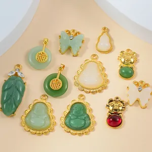 Gold-plated Buddha and jade-style gemstone pendants set with cubic zirconia accents