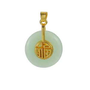 Detailed shot of green chalcedony pendant with gold-plated Fu character centerpiece